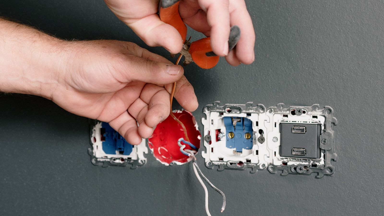 Licensed electrician completing electrical compliance and certificate of compliance work